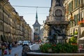 Bern, Switzerland - September 13, 2016: Street view of Kramgasse with fountain and clock tower Royalty Free Stock Photo
