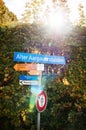 Bern tourism destination signs near Rosengarten park against aft