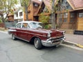 Old red 1957 Chevrolet Chevy Bel Air sport sedan two door parked in the street. Iconic classic car. Royalty Free Stock Photo