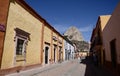 Bernal, Mexico-February 24, 2023: Street in Bernal with PeÃ±a de Bernal in the background