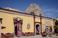 Bernal, Mexico-February 24, 2023: Street in Bernal with PeÃ±a de Bernal in the background