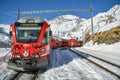 Bernina Express train on Alp Grum stop Royalty Free Stock Photo