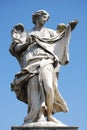 Bernini's marble statue of angel with cross from the Sant' Angelo Bridge in Rome Royalty Free Stock Photo