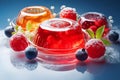 Berries adorn red and orange jelly desserts on clear plates