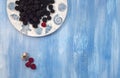Berries, Blackberry, blueberries on blue table Royalty Free Stock Photo