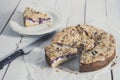 Berries cheesecake coffee cake on wooden table