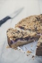 Berries cheesecake coffee cake on wooden table