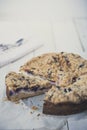 Berries cheesecake coffee cake on wooden table