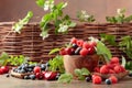 Berries closeup colorful assorted mix of strawberry, blueberry, raspberry and sweet cherry on a old wooden table Royalty Free Stock Photo