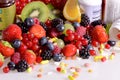 Berries, fruits, vitamins and nutritional supplements Royalty Free Stock Photo