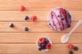 Berries ice cream cup decorated with blueberries and raspberries top Royalty Free Stock Photo