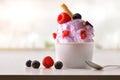 Berries ice cream cup on white table homemade in kitchen Royalty Free Stock Photo