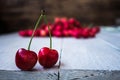 Berries of light cherry on a wooden background