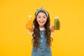 Berries in my bottle. Fruit energy. Smiling kid hold smoothie bottles. Healthy food. Vitamin nutrition. Fresh smoothie Royalty Free Stock Photo