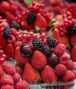 Berries in plastic baskets. Fresh strawberries, raspberries, blackberries, blueberries in takeaway cups. market. close-up Royalty Free Stock Photo