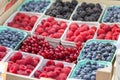 Berries, Raspberries, Blueberries: Berries different kinds and colors, in Boxes, on sale Royalty Free Stock Photo