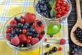 Berries of red-blue color close-up in a glass vase Royalty Free Stock Photo