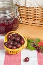 Berries of a red gooseberry and jam Royalty Free Stock Photo