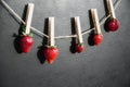 Berries on a wooden clothespins