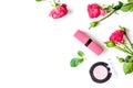 Berry color decorative cosmetics with roses white background top