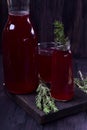 Berry compote in glass bottles Royalty Free Stock Photo