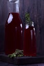 Berry compote in glass bottles Royalty Free Stock Photo