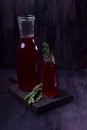 Berry compote in glass bottles Royalty Free Stock Photo