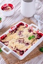Berry crumble in white dish
