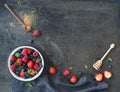 Berry frame with copy space on right. Strawberries, raspberries, blueberries and mint leaves Royalty Free Stock Photo