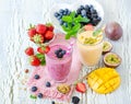 Berry and fruits smoothie, healthy summer detox yogurt drink, di