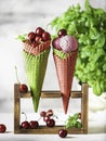 Berry ice cream in a waffle cone on a light background. Cherry ice cream. Ice cream cone with cherry, sweet cherry Royalty Free Stock Photo