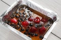 Berry jelly closeup, vegan food in foil box, diet concept