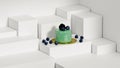 Berry muffin with blueberries and blackberries isolated on a white stand in a pastry shop, treat or sweetness