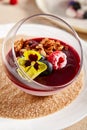 Berry Panna Cotta with Currant-Cointreau jelly in glass bowl