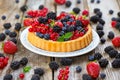 Berry pie with strawberries, blueberries, currants, blackberries