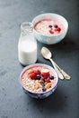 Berry smoothie bowl with buckwheat flakes and almonds Royalty Free Stock Photo