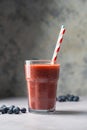 Berry smoothie, fresh banana, blueberry, raspberry, strawberry smoothie in a glass. Royalty Free Stock Photo