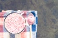 Berry smoothie glass on a napkin Royalty Free Stock Photo