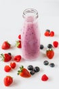 Berry smoothie, Strawberry, raspberry, blueberry and blackberry on white background Royalty Free Stock Photo