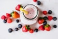 Berry smoothie, Strawberry, raspberry, blueberry and blackberry on white background Royalty Free Stock Photo