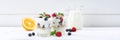 Berry yogurt yoghurt with berries fruits cup muesli banner wooden board copyspace breakfast