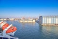 Berth cargo port with cranes on the background of the morning sky Royalty Free Stock Photo