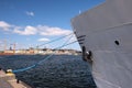 Berthing ropes on a pier with the big ship, vacation travel concept Royalty Free Stock Photo