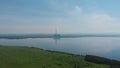 Aerial drone view of lake landscape with road