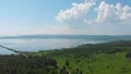 Aerial drone view of lake landscape with road