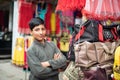 BESHAM, PAKISTAN - April 15, 2018: Unidentified smiling young boy standing by the street market