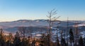 Beskid Zywiecki with Pilsko hill from hiking trail bellow Tyniok hill in winter Beskid Slaski mountains in Poland Royalty Free Stock Photo