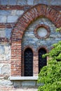 Besnate cross church varese sunny day bush