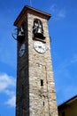 Besnate in italy the wall and church bell sunny day