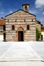 Besnate old architecture wall and church in sunny day